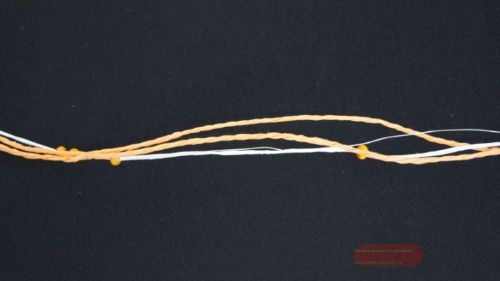 Bild von Girlande 10m/ 5mm, 3x Schnur/-Holzperlen, orange