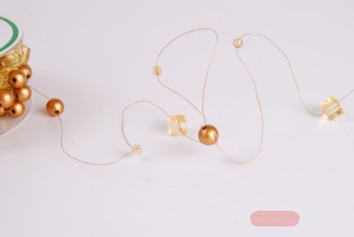 Bild von Girlande 20m/ 10mm, Würfel & Perlen, gold