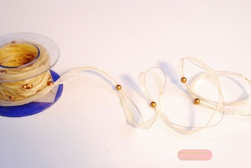 Bild von Girlande 10m/ 10mm, Organza mit Perlen, ecru